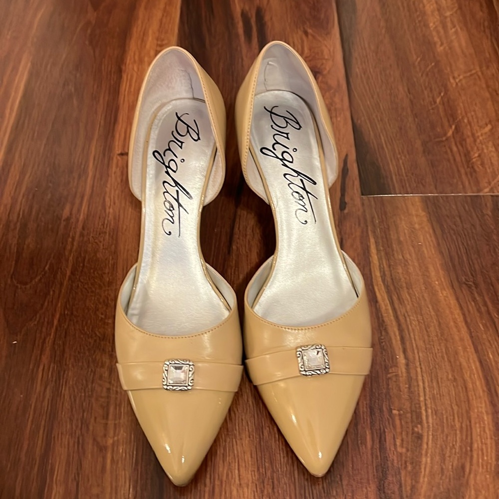 Brighton leather patent toe pumps.